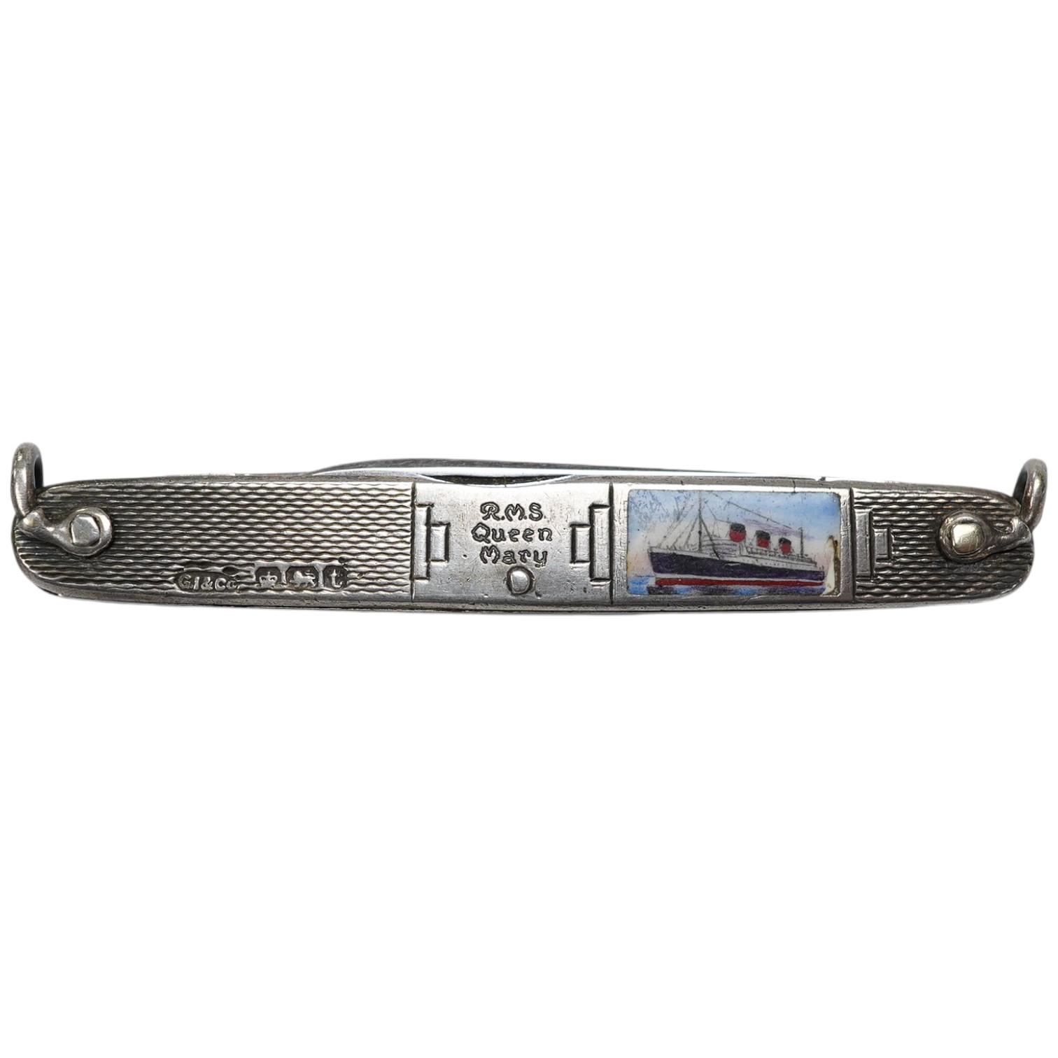 A George V engine turned silver and enamel pocket knife, decorated with R.M.S Queen Mary, the blades lifted by the handles, George Ibberson & Co, Sheffield, 1936, 76mm. Condition - poor to fair